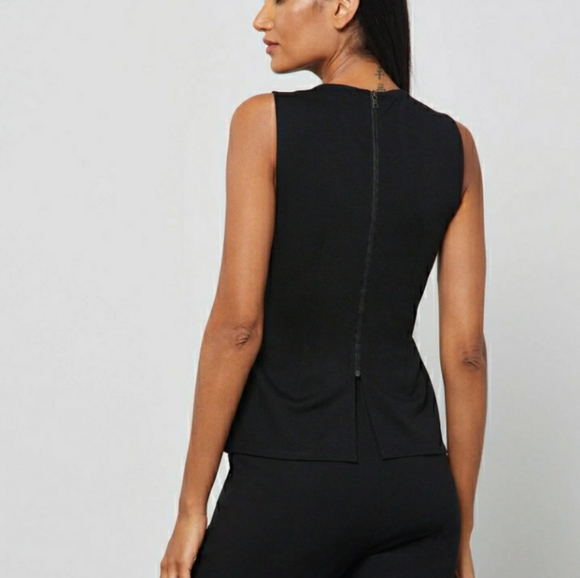 🌱 BCBGMaxAzria Faux Leather Sleeveless Peplum Top Black Sz XXS - Picture 8 of 10